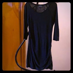 Black express dress, rouged sides , above knee